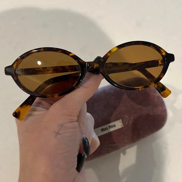 Miu Miu Oval Sunglasses - Picture 1 of 4